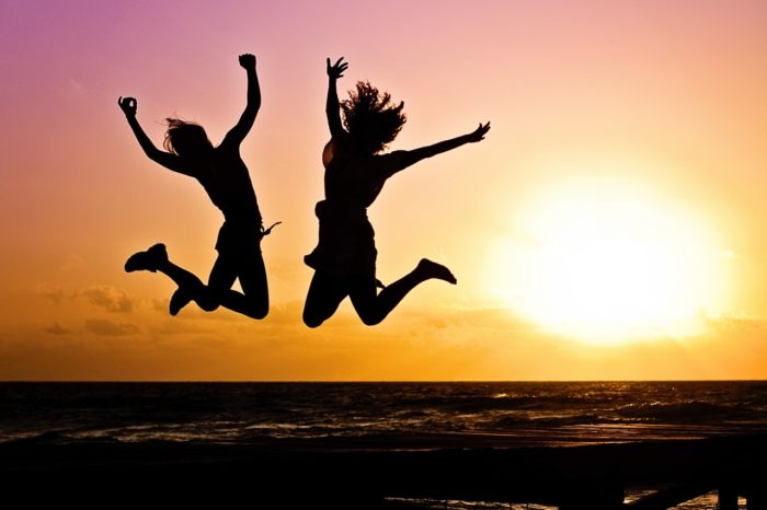 youth-active-jump-happy-40815 people exercising and celebrating at sunset on the beach